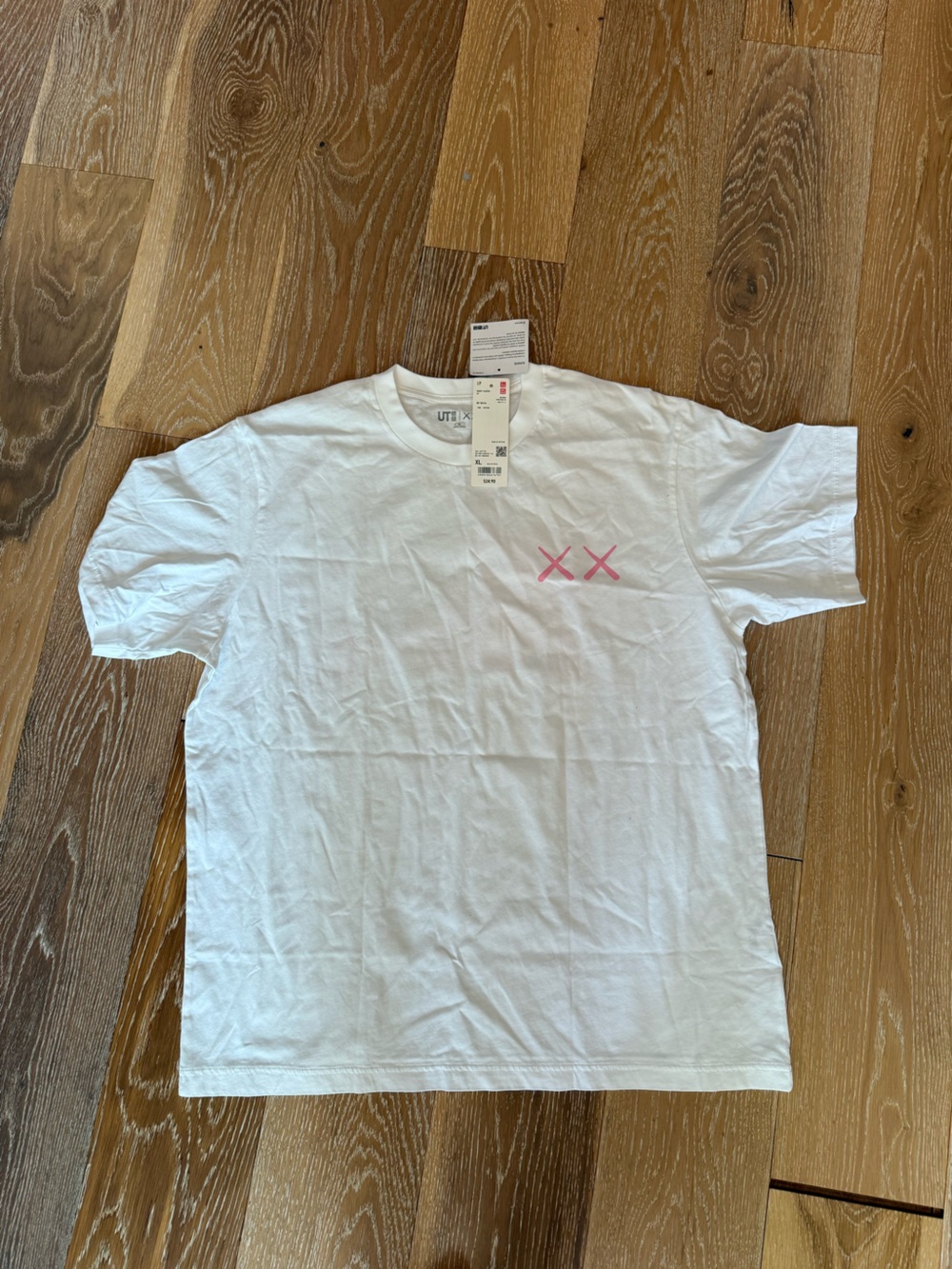 KAWS × Uniqlo UT Short Sleeve Graphic
T-shirt Size XL Pink BFF new - Picture 6 of 12